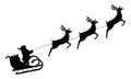 Santa Claus rides in a sleigh in harness on the reindeer Royalty Free Stock Photo