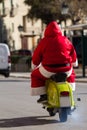 Santa Claus riding a motorcycle