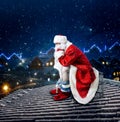 Santa Claus on rooftop shit in the chimney