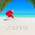 Santa Claus run at palm beach 2019 with Christmas sack Royalty Free Stock Photo