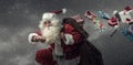 Santa Claus running and delivering gifts Royalty Free Stock Photo