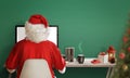 Santa Claus shopping online during the Christmas sale Royalty Free Stock Photo