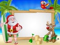 Santa Claus and Reindeer Christmas Beach Sign Royalty Free Stock Photo