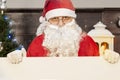 Santa claus showing a blank billboard Royalty Free Stock Photo