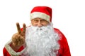 Santa Claus showing victory gesture Royalty Free Stock Photo