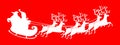 Santa Claus silhouette riding a sleigh with deers Royalty Free Stock Photo