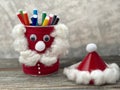 Santa Claus from simple material, recycling empty jar. Stand for pencils. Royalty Free Stock Photo
