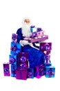 Santa Claus sitting with lots of presents