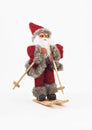 Santa Claus on skis tree a toy isolated Royalty Free Stock Photo