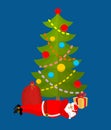 Santa Claus Sleeping under Christmas tree. Sleeping grandfather. Royalty Free Stock Photo