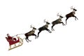 Santa Claus in a sleigh pulled by reindeer flying up to deliver presents to kids on Christmas Eve. Isolated 3D illustration Royalty Free Stock Photo