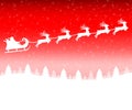 Santa Claus in a sleigh with a reindeer team flies in the Christmas forest Royalty Free Stock Photo