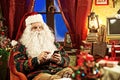 Santa Claus and smartphone Royalty Free Stock Photo