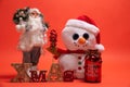 Santa Claus, Snoman toy and wooden Xmas text sign