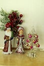Santa Claus and Snow Maiden are standing near the Christmas tree Royalty Free Stock Photo