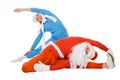 Santa Claus and the Snow Maiden of yoga Royalty Free Stock Photo