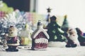 Santa Claus, snowman, houses & snow Sledge miniature model studio shot on colorful background for family, giving, season, Royalty Free Stock Photo