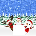 Santa Claus with snowman and reindeer peeking Royalty Free Stock Photo