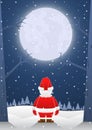 Santa claus standing alone on christmas night with big moon