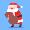 Santa Claus standing with a big backbag full of presents. Cute Royalty Free Stock Photo