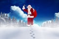 Santa claus standing in snow during christmas time Royalty Free Stock Photo