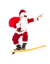 Santa Claus surfing with surf board Royalty Free Stock Photo