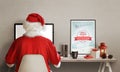 Santa Claus surfs the web on laptop. On his table is lantern, picture, gifts, books and a cup of hot tea