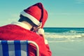 Santa claus taking a nap on the beach Royalty Free Stock Photo