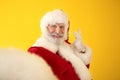 Santa Claus taking selfie on color background Royalty Free Stock Photo