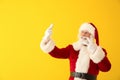 Santa Claus taking selfie on color background Royalty Free Stock Photo