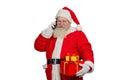 Santa Claus talking on cellphone.