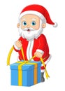 The Santa claus is tying a big gift and smiling with a good pose