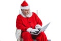 Santa claus using laptop Royalty Free Stock Photo