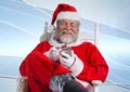 Santa claus using mobile phone Royalty Free Stock Photo