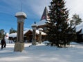 Crossing the Arctic Circle at Santa Claus Village in Rovaniemi, Finnish Lapland