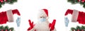 Santa Claus wearing a medical mask, his eyes and arms wide open and pointing at medical masks given to him by other Santas. Banner