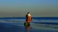 Santa Claus on winter holidays on hot beach. Happy New Year and merry Christmas travel, tropical vacations concept. Royalty Free Stock Photo