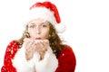 Santa Claus woman is blowing Christmas snow Royalty Free Stock Photo