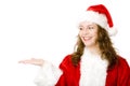 Santa Claus woman hols hand for advertisement sign Royalty Free Stock Photo