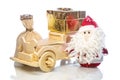 Santa Claus with wooden car, gift box and sack Royalty Free Stock Photo