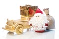 Santa Claus with wooden car, gift box and sack Royalty Free Stock Photo