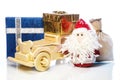 Santa Claus with wooden car, gift boxes and sack Royalty Free Stock Photo