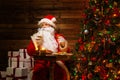 Santa Claus in wooden home interior Royalty Free Stock Photo