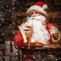 Santa Claus in wooden home interior Royalty Free Stock Photo