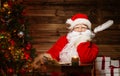 Santa Claus in wooden home interior Royalty Free Stock Photo