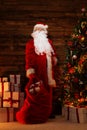 Santa Claus in wooden home interior Royalty Free Stock Photo