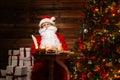 Santa Claus in wooden home interior Royalty Free Stock Photo