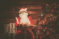 Santa Claus in wooden home interior Royalty Free Stock Photo