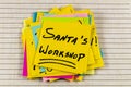 Santa claus workshop list happy Christmas holiday season north pole Royalty Free Stock Photo