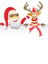 Santa Clause and Reindeer Holding Blank paper Royalty Free Stock Photo
